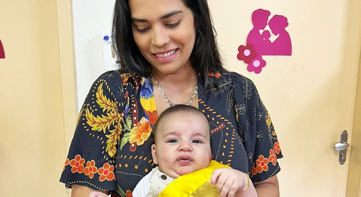 Pequeno Augusto de três meses, filho da vendedora Lorena Pereira, foi eleito o Bebê Dourado da USF da Arne 53