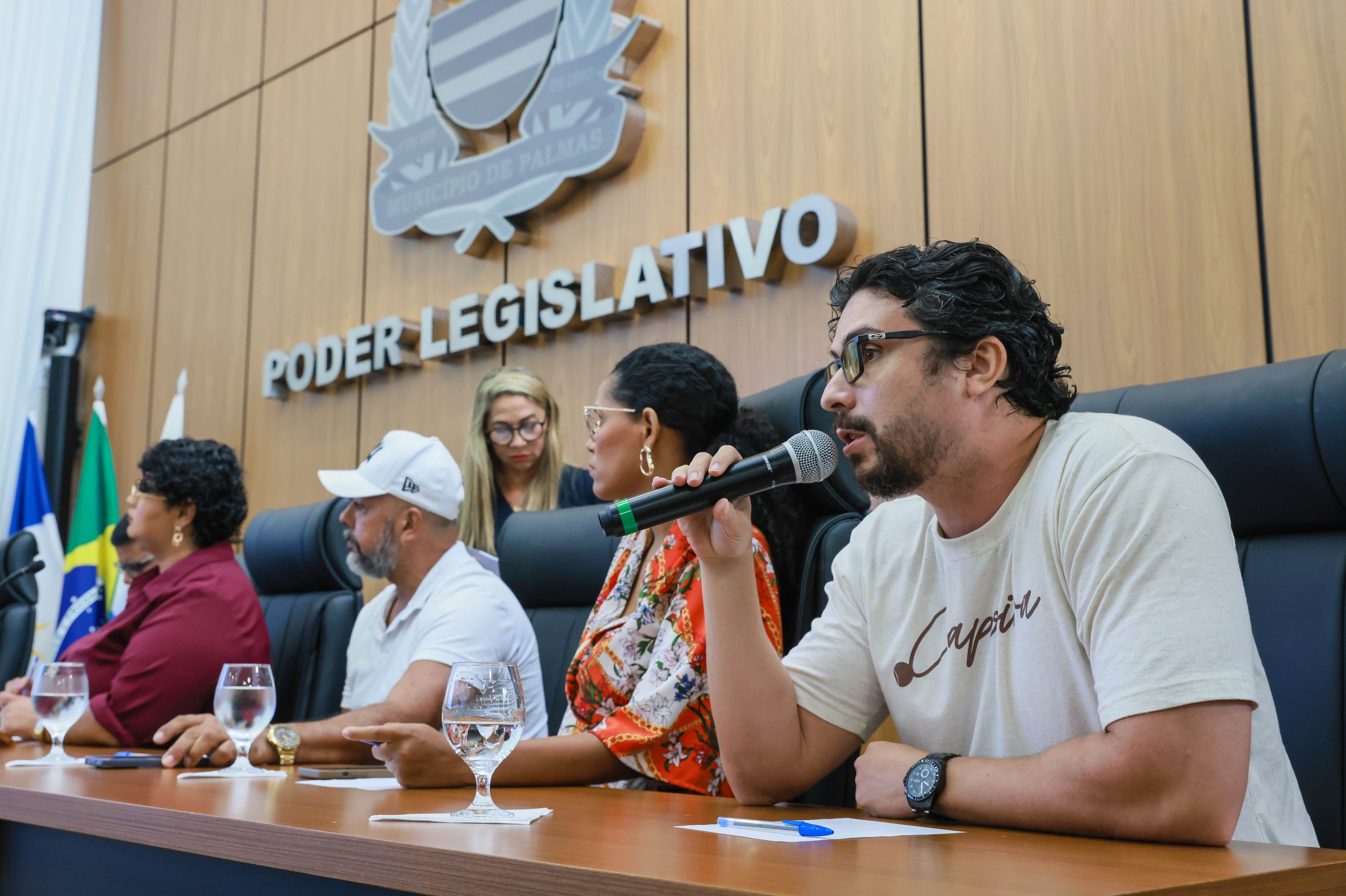 1ª Audiência Pública sobre o Fortalecimento da Capoeira A Prefeitura de Palmas, por meio da Secretaria Extraordinária de Igualdade Racial e Direitos Humanos (Seirdh), realiza nesta quinta-feira, 24, às 9 horas, a 1ª Audiência Pública sobre o fortalecimento da capoeira na Capital. O encontro acontece no Plenário da Câmara Municipal de Palmas, com a presença de representantes do poder público, capoeiristas, movimentos sociais e membros da comunidade.Data: 24/04/2025Local: Câmara Municipal de Palmas - Palmas - TOFoto: Júnior Suzuki